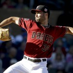 Arizona Diamondbacks starting pitcher Robbie Ray throws against the Los Angeles Angels during first inning of a spring baseball game in Scottsdale, Ariz., Tuesday, March 8, 2016. (AP Photo/Chris Carlson)