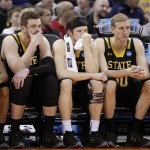 The South Dakota State bench watches in the last minutes during the second half of a first-round men's college basketball game against Maryland in the NCAA Tournament in Spokane, Wash., Friday, March 18, 2016. (AP Photo/Young Kwak)
