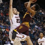 Arizona State guard Tra Holder shoots over Oregon State center Gligorije Rakocevic during the first half of an NCAA college basketball game in the first round of the Pac-12 men's tournament Wednesday, March 9, 2016, in Las Vegas. (AP Photo/John Locher)