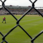 Arizona Diamondbacks left fielder David Peralt waits in the outfield during the fifth inning of a spring training baseball game against the Seattle Mariners, Monday, March 7, 2016, in Peoria, Ariz. (AP Photo/Charlie Riedel)