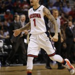 Arizona guard Gabe York celebrates after scoring against Colorado during the first half of an NCAA college basketball game in the quarterfinals of the Pac-12 men's tournament Thursday, March 10, 2016, in Las Vegas. (AP Photo/John Locher)
