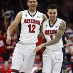 Arizona forward Ryan Anderson (12) and Gabe York celebrate after defeating Stanford 94-62 in an NCAA college basketball game, Saturday, March 5, 2016, in Tucson, Ariz. (AP Photo/Rick Scuteri)