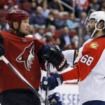 Florida Panthers' Jaromir Jagr (68), of the Czech Republic, argues with Arizona Coyotes' Nicklas Grossmann, left, of Sweden, during the second period of an NHL hockey game Saturday, March 5, 2016, in Glendale, Ariz. (AP Photo/Ross D. Franklin)
