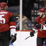 Arizona Coyotes' Tobias Rieder (8), of Germany, celebrates his goal against the Dallas Stars with Connor Murphy (5) during the first period of an NHL hockey game, Thursday, March 24, 2016, in Glendale, Ariz. (AP Photo/Ross D. Franklin)