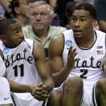 Michigan State's Lourawls Nairn Jr. (11) and teammate Javon Bess sit on the bench late in the second half of a first-round men's college basketball game against Middle Tennessee in the NCAA tournament, Friday, March 18, 2016, in St. Louis. Middle Tennessee won 90-81. (AP Photo/Jeff Roberson)