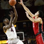 Arizona State's Gerry Blakes takes a shot as Stanford's Dorian Pickens defends during an NCAA college basketball game Thursday, March 3, 2016, in Tempe, Ariz. (Danny Miller/The Arizona Republic via AP)