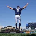 San Diego Padres' Adam Rosales warms up prior to a spring training baseball game against the Arizona Diamondbacks, Tuesday, March 8, 2016, in Peoria, Ariz. (AP Photo/Ross D. Franklin)