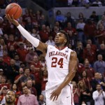 Oklahoma guard Buddy Hield (24) goes up for a basket against VCU in the second half during a second-round men's college basketball game in the NCAA Tournament in Oklahoma City, Sunday, March 20, 2016. Oklahoma won 85-81. (AP Photo/Alonzo Adams)
