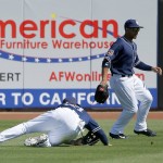 San Diego Padres' Matt Kemp, left, is unable to make a catch on a ball hit by Arizona Diamondbacks' A.J. Pollock as Padres' Jon Jay, right, arrives to get the baseball during the second inning of a spring training baseball game, Tuesday, March 8, 2016, in Peoria, Ariz. (AP Photo/Ross D. Franklin)