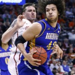 Cal State Bakersfield center Aly Ahmed (42) moves around Oklahoma forward Ryan Spangler, left, in the first half of a first-round men's college basketball game in the NCAA Tournament, Friday, March 18, 2016, in Oklahoma City. Oklahoma won 82-68. (AP Photo/Alonzo Adams)
