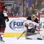 Anaheim Ducks' Frederik Andersen, right, of Denmark, makes a save on a shot by Arizona Coyotes' Anthony Duclair, left, during the first period of an NHL hockey game Thursday, March 3, 2016, in Glendale, Ariz. (AP Photo/Ross D. Franklin)