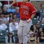 Los Angeles Angels' Ji-Man Choi, of South Korea, celebrates after a home run against the Arizona Diamondbacks during sixth inning of a spring baseball game in Scottsdale, Ariz., Tuesday, March 8, 2016. (AP Photo/Chris Carlson)
