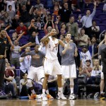 Phoenix Suns players celebrate a basket during the second half of an NBA basketball game against the Minnesota Timberwolves, Monday, March 14, 2016, in Phoenix. The Suns won 107-104. (AP Photo/Matt York)