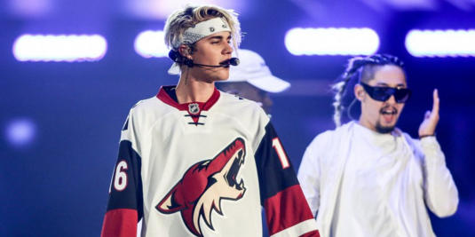 Justin Bieber is wearing a Max Domi Coyotes jersey