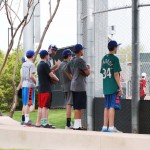 Young big leaguers to-be watch the D-backs work out before they head to Surprise. (Photo by Jessica Watts/Cronkite News)