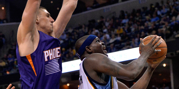 Memphis Grizzlies forward Zach Randolph (50) shoots against Phoenix Suns centers Alex Len, center, ...