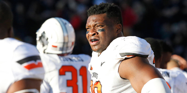 File - In this Oct. 31, 2015, photo, Oklahoma State defensive end Emmanuel Ogbah (38) is pictured ...