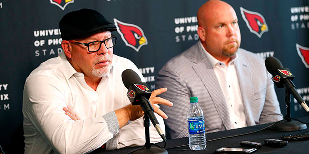 Arizona Cardinals head coach Bruce Arians, left, and general manager Steve Keim discuss the upcomin...