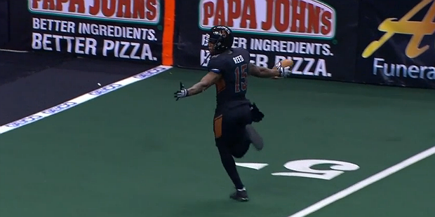 Kerry Reed of the Arizona Rattlers celebrates while returning an interception 40 yards for a touchd...