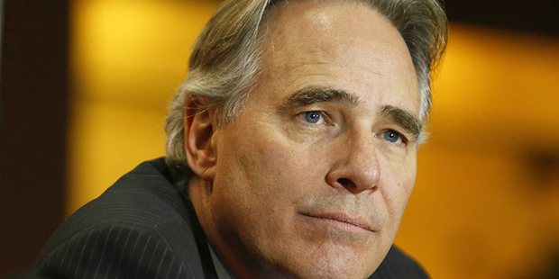 FILE - In this Dec. 15, 2013, file photo, University of Texas athletic director Steve Patterson dis...