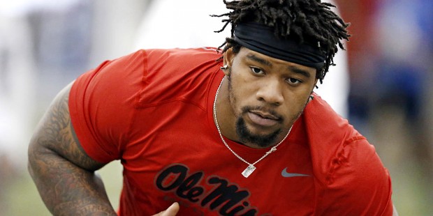 Defensive tackle Robert Nkemdiche steps into an agility drill at Mississippi's NFL football Pro Day...