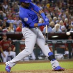 Chicago Cubs Jorge Soler connects for an RBI base hit against the Arizona Diamondbacks during the seventh inning of a baseball game, Sunday, April 10, 2016, in Phoenix. (AP Photo/Matt York)
