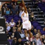 Phoenix Suns guard Ronnie Price dunks against the Sacramento Kings during the first half of an NBA basketball game, Monday, April 11, 2016, in Phoenix. (AP Photo/Matt York)
