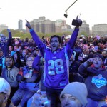 A fan yells as NFL Commissioner Roger Goodell opens up the 2016 NFL football draft at Selection Square in Grant Park, Thursday, April 28, 2016, in Chicago. (AP Photo/Matt Marton)