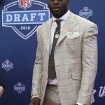 Clemson's Shaq Lawson poses for photos upon arriving for the first round of the 2016 NFL football draft at the Auditorium Theater of Roosevelt University, Thursday, April 28, 2016, in Chicago. (AP Photo/Nam Y. Huh)