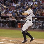 Pittsburgh Pirates' Sean Rodriguez watches the flight of his two-run home run against the Arizona Diamondbacks during the second inning of a baseball game Friday, April 22, 2016, in Phoenix. (AP Photo/Ross D. Franklin)