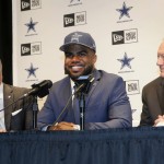 Dallas Cowboys Director of Player Personnel Stephen Jones, left, and team owner Jerry Jones, right, listen as first-round draft pick Ezekiel Elliott, center, answers questions at a news conference at the NFL football team's facility, Friday, April 29, 2016, in Irving, Texas. (AP Photo/Tony Gutierrez)