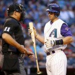 Arizona Diamondbacks' Paul Goldschmidt (44) talks with home plate umpire Tony Randazzo after a called third strike against the St. Louis Cardinals during the first inning of a baseball game, Thursday, April 28, 2016, in Phoenix. (AP Photo/Matt York)