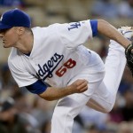 Los Angeles Dodgers starting pitcher Ross Stripling follows through on a delivery to the Arizona Diamondbacks during first inning of a baseball game in Los Angeles, Thursday, April 14, 2016. (AP Photo/Chris Carlson)