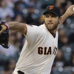 San Francisco Giants pitcher Madison Bumgarner throws against the Arizona Diamondbacks during the first inning of a baseball game in San Francisco, Wednesday, April 20, 2016. (AP Photo/Jeff Chiu)