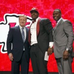 Mississippi State's Chris Jones poses for photos with NFL Commissioner Roger Goodell, left, and former NFL player Tony Richardson after being selected by Kansas City Chiefs as 37th pick in the second round of the 2016 NFL football draft, Friday, April 29, 2016, in Chicago. (AP Photo/Charles Rex Arbogast)