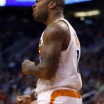 Phoenix Suns forward P.J. Tucker  reacts to a foul during the second half of an NBA basketball game against the Sacramento Kings, Monday, April 11, 2016, in Phoenix. (AP Photo/Matt York)