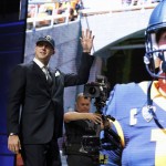 California's Jared Goff waves as after being selected by the Los Angeles Rams as 1st pick in the first round of the 2016 NFL football draft, Thursday, April 28, 2016, in Chicago. (AP Photo/Charles Rex Arbogast)