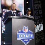 NFL Commissioner Roger Goodell introduces former NFL player Willie Brown as Brown announces that the Oakland Raiders selects Illinois' Jihad Ward as the 44th pick in the second round of the 2016 NFL football draft, Friday, April 29, 2016, in Chicago. (AP Photo/Charles Rex Arbogast)