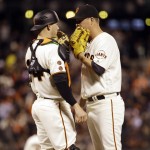 San Francisco Giants starting pitcher Matt Cain, right, talks to catcher Trevor Brow after Cain threw a wild pitch during the fourth inning of a baseball game against the Arizona Diamondbacks on Tuesday, April 19, 2016, in San Francisco. (AP Photo/Marcio Jose Sanchez)