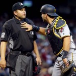 Pittsburgh Pirates catcher Francisco Cervelli, right,argues the call with home plate umpire Clint Fagan after Arizona Diamondbacks' Paul Goldschmidt was walked during the fifth inning of a baseball game, Saturday, April 23, 2016, in Phoenix. (AP Photo/Matt York)
