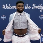 Ohio State's Ezekiel Elliott poses for photos upon arriving for the first round of the 2016 NFL football draft at the Auditorium Theater of Roosevelt University, Thursday, April 28, 2016, in Chicago. (AP Photo/Nam Y. Huh)