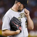 Pittsburgh Pirates pitcher Jonathon Niese pauses on the mound after noticing manager Clint Hurdle coming out of the dugout to take him out of the baseball game during the sixth inning against the Arizona Diamondbacks on Friday, April 22, 2016, in Phoenix. (AP Photo/Ross D. Franklin)