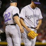 Colorado Rockies starting pitcher Jorge De La Rosa (29) is pulled from the game by manager Walt Weiss (22) during the fifth inning of a baseball game against the Arizona Diamondbacks, Monday, April 4, 2016, in Phoenix. (AP Photo/Matt York)
