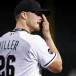Arizona Diamondbacks' Shelby Miller pauses on the mound after giving up his third home run to the Colorado Rockies of the fourth inning of a baseball game Tuesday, April 5, 2016, in Phoenix. (AP Photo/Ross D. Franklin)