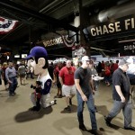 Fans arrive at Chase Field prior to an opening day baseball game between the Colorado Rockies and the Arizona Diamondbacks, Monday, April 4, 2016, in Phoenix. (AP Photo/Matt York)