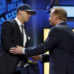 California's Jared Goff shakes hands with NFL commissioner Roger Goodell after being selected by the Los Angeles Rams as the first pick in the first round of the 2016 NFL football draft, Thursday, April 28, 2016, in Chicago. (AP Photo/Charles Rex Arbogast)