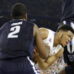 North Carolina forward Kennedy Meeks (3)and Villanova forward Kris Jenkins (2) struggle for the ball during the second half of the NCAA Final Four tournament college basketball championship game Monday, April 4, 2016, in Houston. (AP Photo/David J. Phillip)