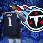 Michigan State's Jack Conklin poses for photos after being selected by Tennessee Titans as the eighth pick in the first round of the 2016 NFL football draft, Thursday, April 28, 2016, in Chicago. (AP Photo/Charles Rex Arbogast)