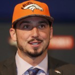 Denver Broncos' first-round selection in the NFL football draft quarterback Paxton Lynch, from Memphis, responds to questions after he was introduced Friday, April 29, 2016, in the team's headquarters in Englewood, Colo. (AP Photo/David Zalubowski)