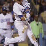 Los Angeles Dodgers' Enrique Hernandez hits an RBI double against the Arizona Diamondbacks during seventh inning of a baseball game in Los Angeles, Thursday, April 14, 2016. (AP Photo/Chris Carlson)